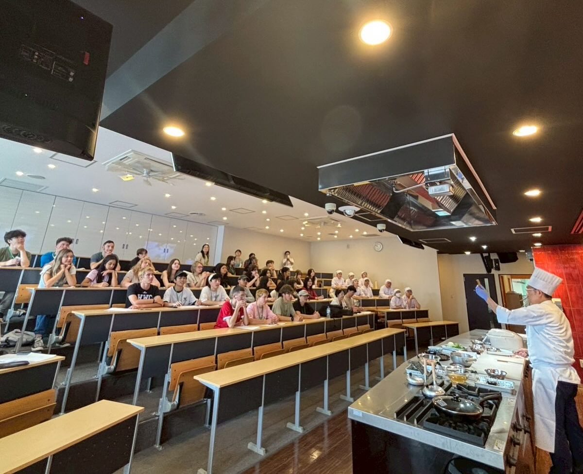 Students watching a cooking demonstration